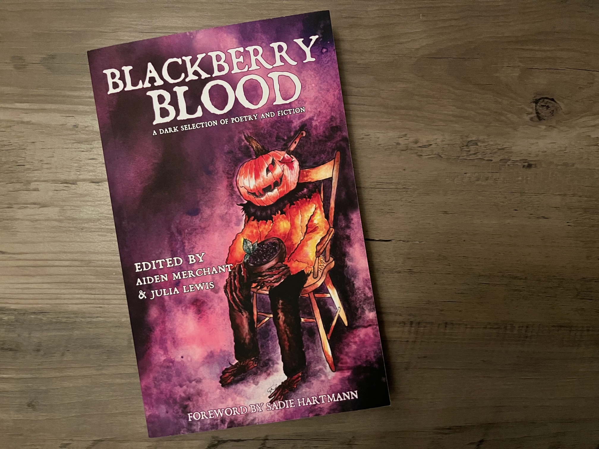 Blackberry Blood Anthology edited by Aiden Merchant and Julia Lewis book photo by Erica Robyn Reads