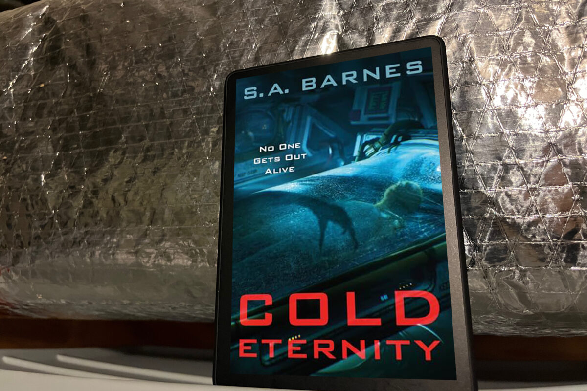 Cold Eternity by S.A. Barnes | Book cover features a human in a glass pod with a spooky shadow of a hand reaching over